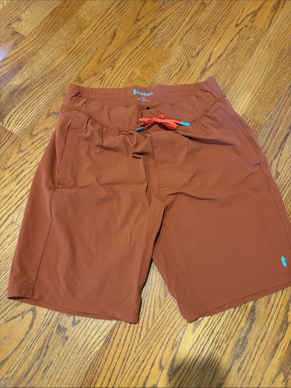 cotopaxi Men’s Rust Hybrids with Coral Drawcord
